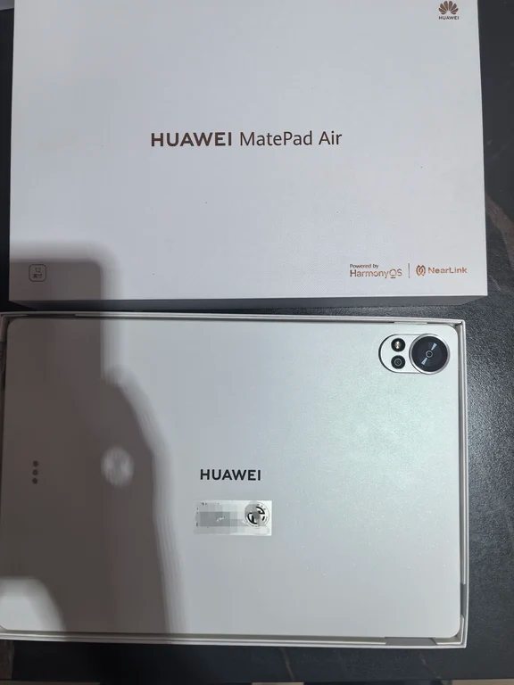 White Huawei MatePad Air tablet resting in its retail packaging box.