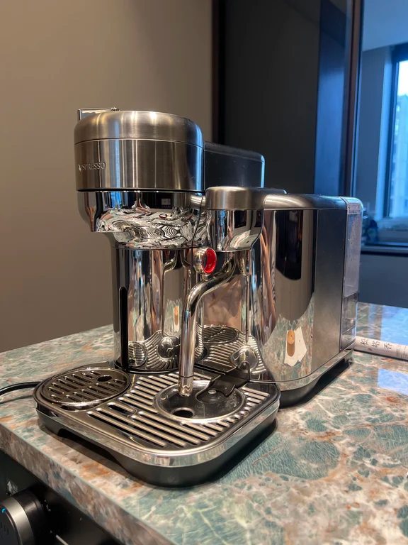 Stainless steel Nespresso Creatista capsule espresso machine with integrated steam wand