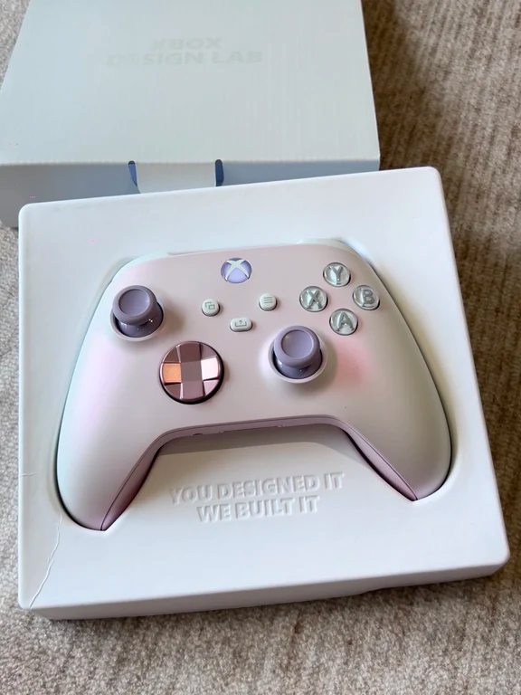 Xbox Design Lab custom controller in soft lilac and metallic accents inside box