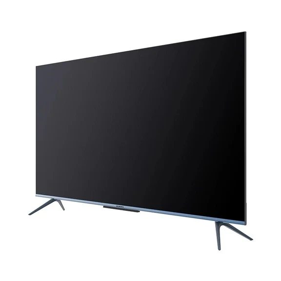 A slim modern smart television shown from a perspective angle on dual stand legs with a dark screen